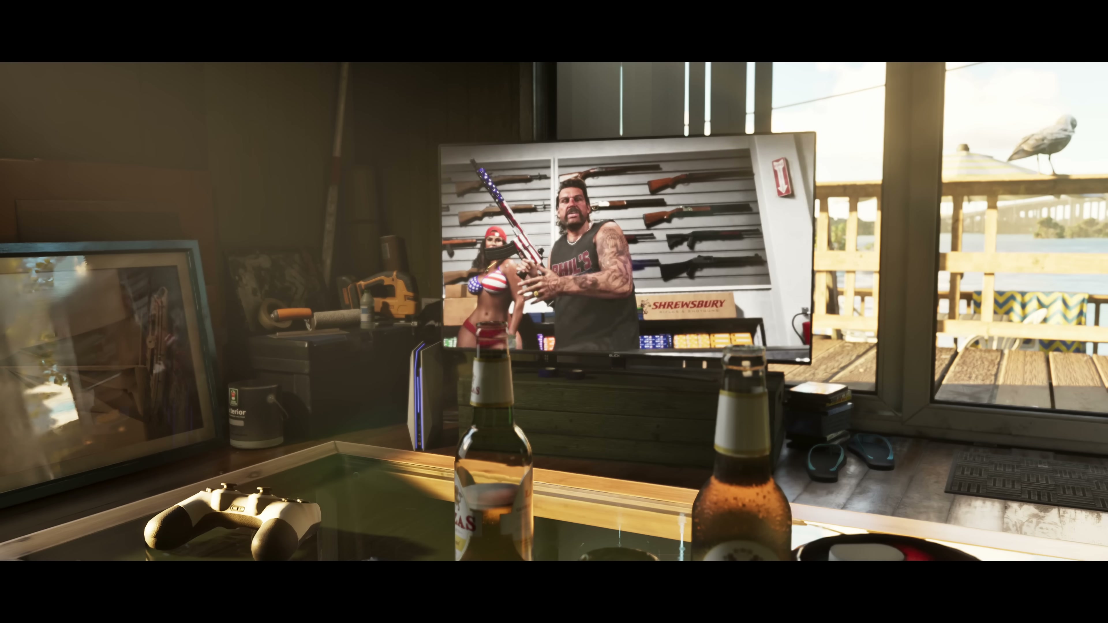 Living room TV showing a tattooed man with rifle next to a wall of firearms